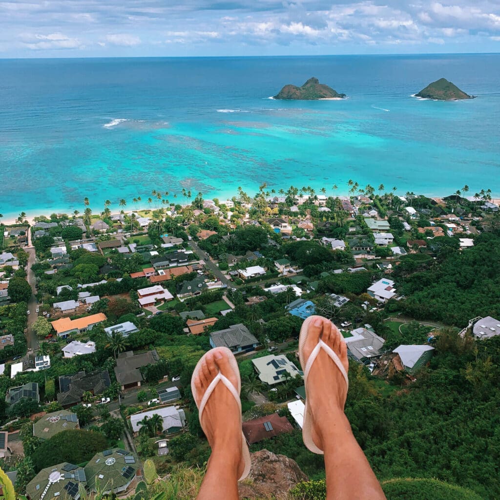 Feet dangling over the clifftop viewpoint at Pillbox Hike