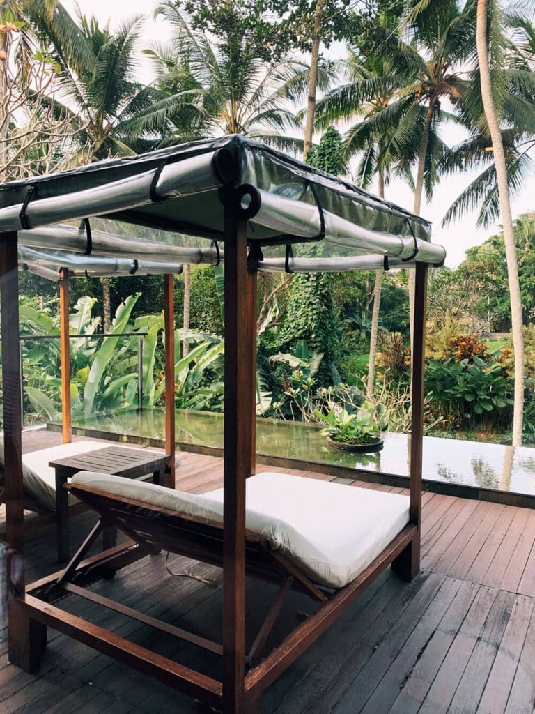 Pool suite day bed at Plataran Ubud with a private infinity pool