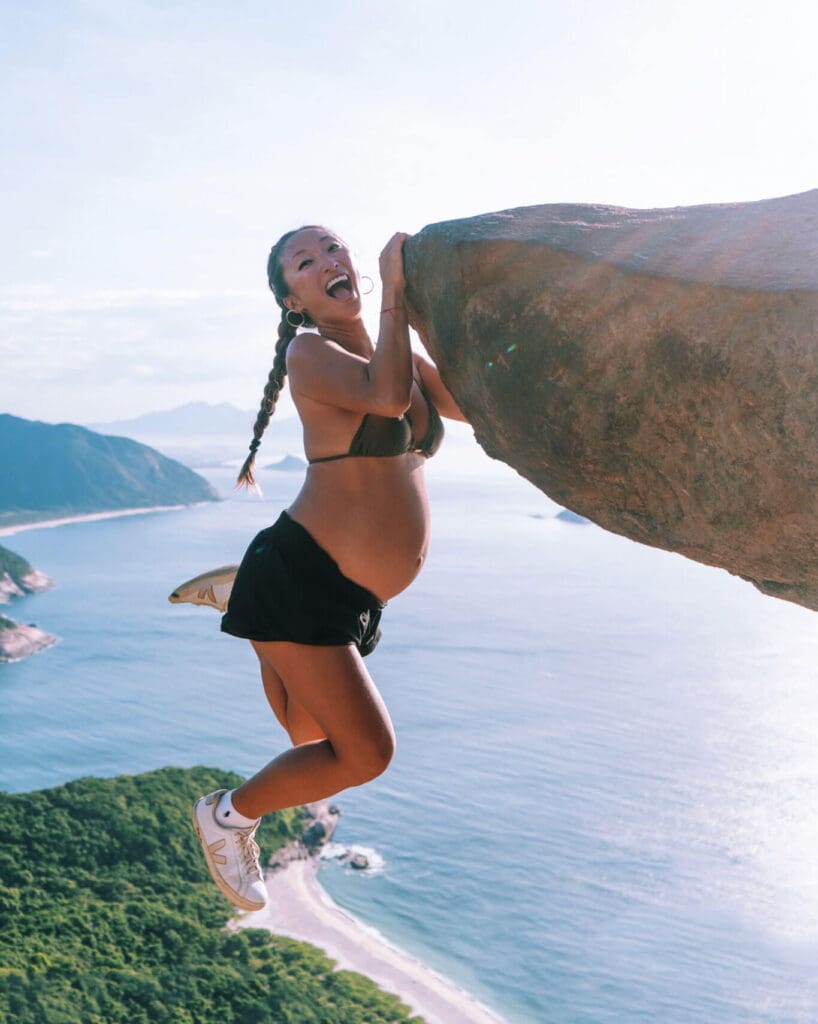 Danielle dangling off the rock